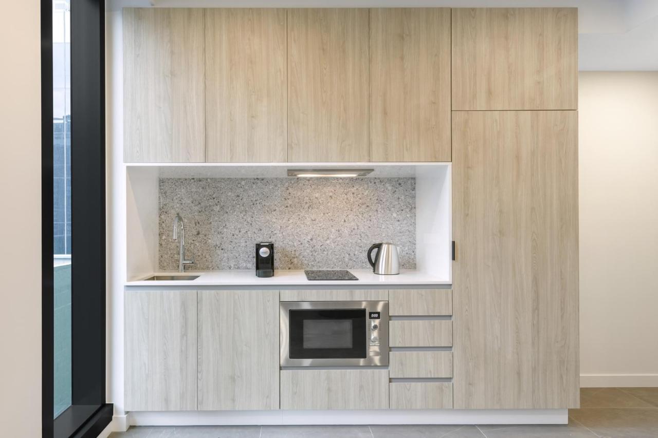 Meriton Suites Мельбурн Екстер'єр фото A kitchen in a serviced apartment