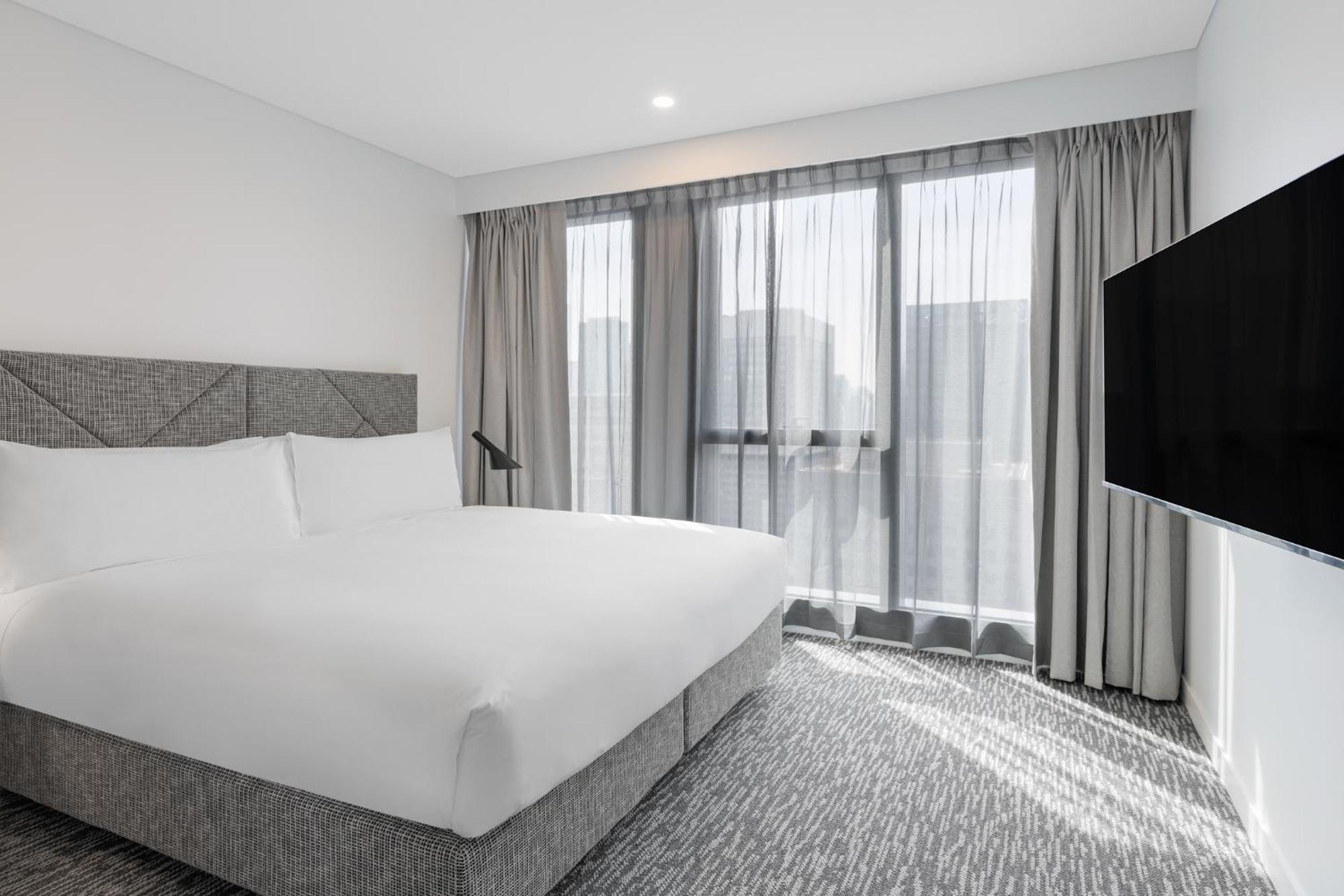 Meriton Suites Мельбурн Екстер'єр фото A bedroom at the hotel