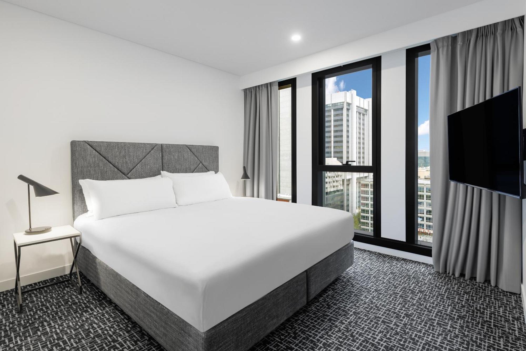 Meriton Suites Мельбурн Екстер'єр фото A bedroom at the hotel